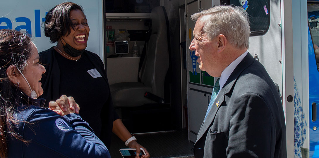 Sen. Durbin and staff from Lurie Children's Hospital outside in front of mobile health unit