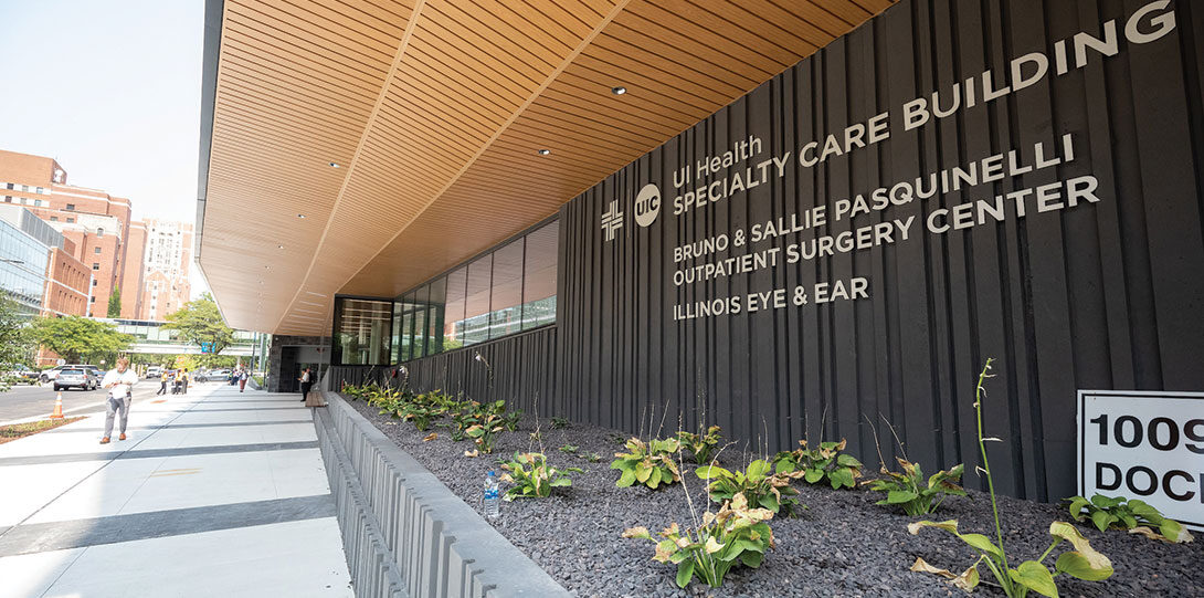 wide angle photo of north wall of building with name of building and Bruno and Sallie Pasquinelli Outpatient Surgery Center