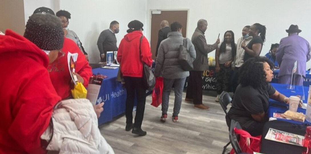 African Americans from the Auburn Gresham neighborhood browsing the various booths and presentations