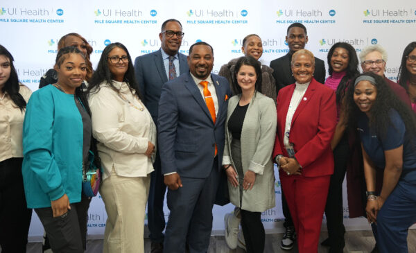 a group of community members and UIC representatives at the Auburn Gresham Healthy Lifestyle Hub